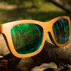 Original Jnglst Bamboo Sunglasses with green lenses